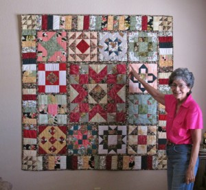 Delma with wall quilt -- 7-18-14
