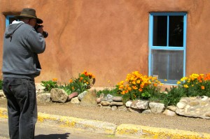 My shot of John shooting poppies on Ledoux Street in Taos