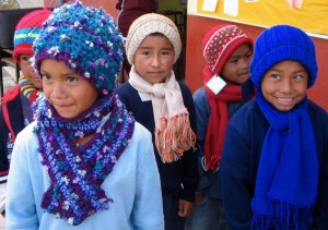Some of the campo kids wearing their new, handmade hats and scarves